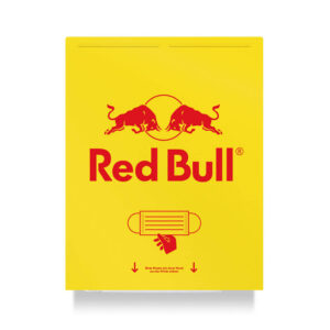 Gelb-roter Maskenspender mit einer abgebildeten Hand, die eine Maske zieht, dem Redbull-Logo und dem Hinweis 'Bitte Maske mit einer Hand aus der Mitte ziehen', gekennzeichnet durch zwei Pfeile.